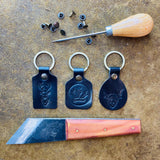 black leather highland cow key chains