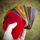 colourful leather highland cow coasters