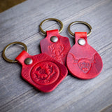 red leather highland cow stag thistle key chains