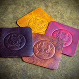 handcrafted full grain and vegetable tanned leather colourful coasters from scotland