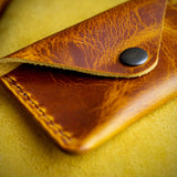 handmade tan leather coin purse