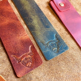 brown and green highland cow bookmarks
