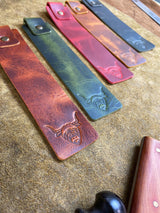 handcrafted leather bookmarks with highland cow illustration
