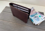 brown billfold wallet
